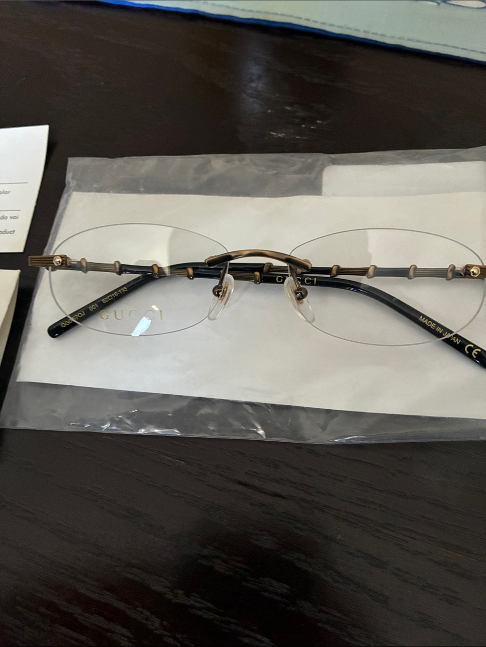 Gucci Black and Gold Rimless Designer Eyeglasses